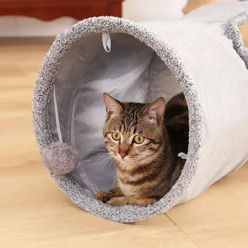 Collapsible cat tunnel made of crinkle suede with a peek hole, designed for cat play and exploration