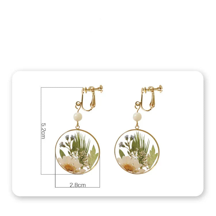 Elegant natural floral earrings with dried flowers and copper gilding, embodying British style and sophistication