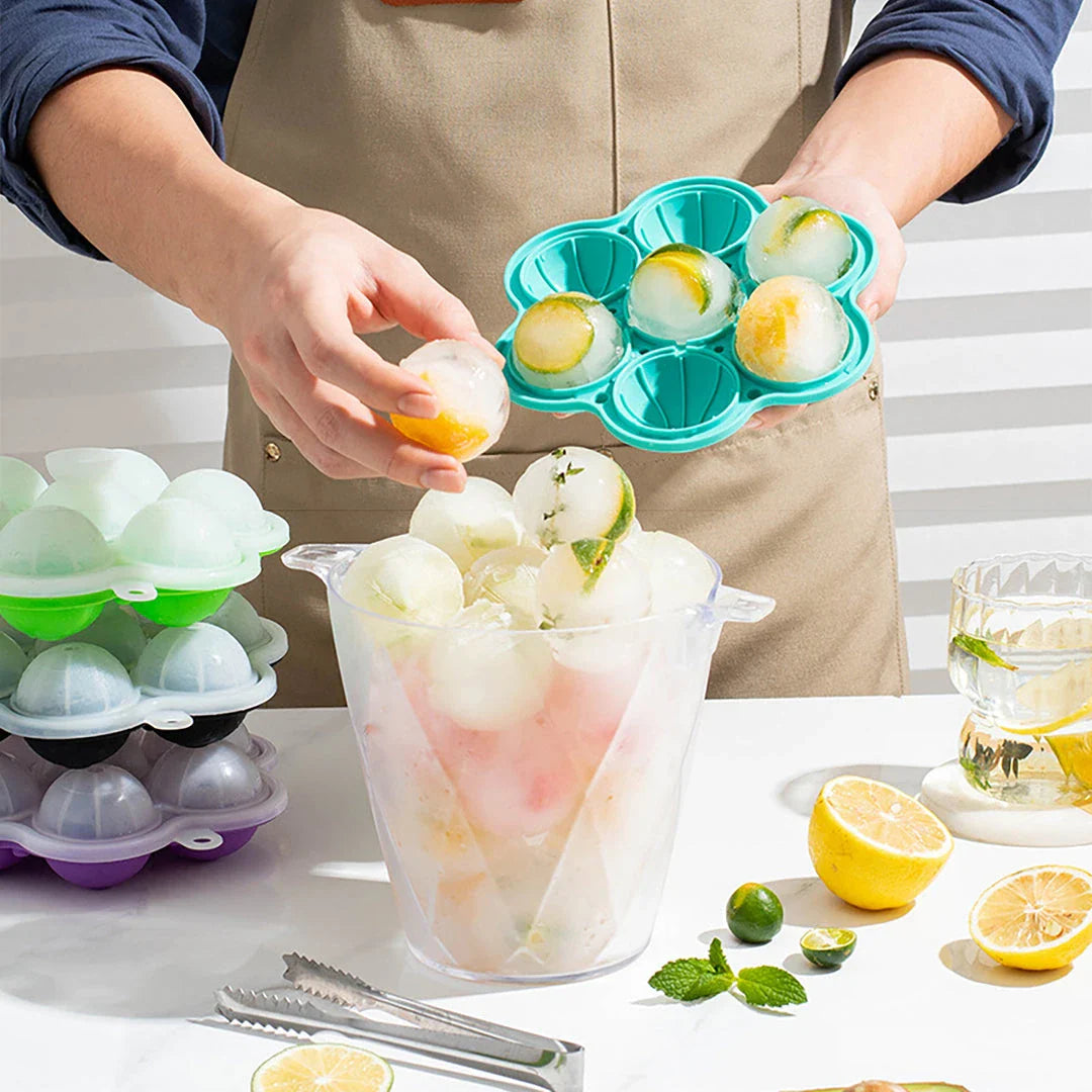 Spherical silicone ice mould with seven holes for creating elegant ice spheres to chill premium drinks
