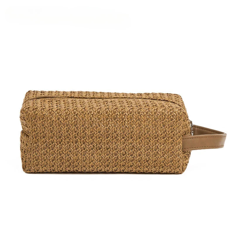 Elegant straw cosmetic bag with unique knitting pattern, perfect for organising beauty essentials