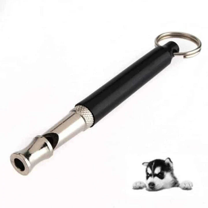 Compact ultrasonic dog training whistle with durable metal and plastic construction for effective communication and reliable performance