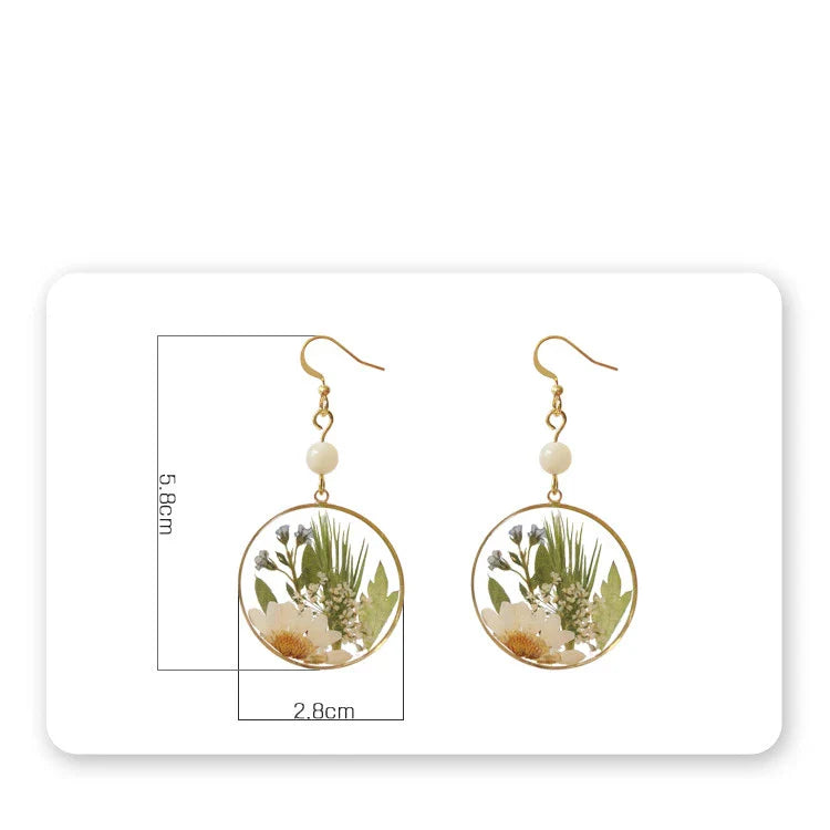 Elegant natural floral earrings with dried flowers and copper gilding, embodying British style and sophistication
