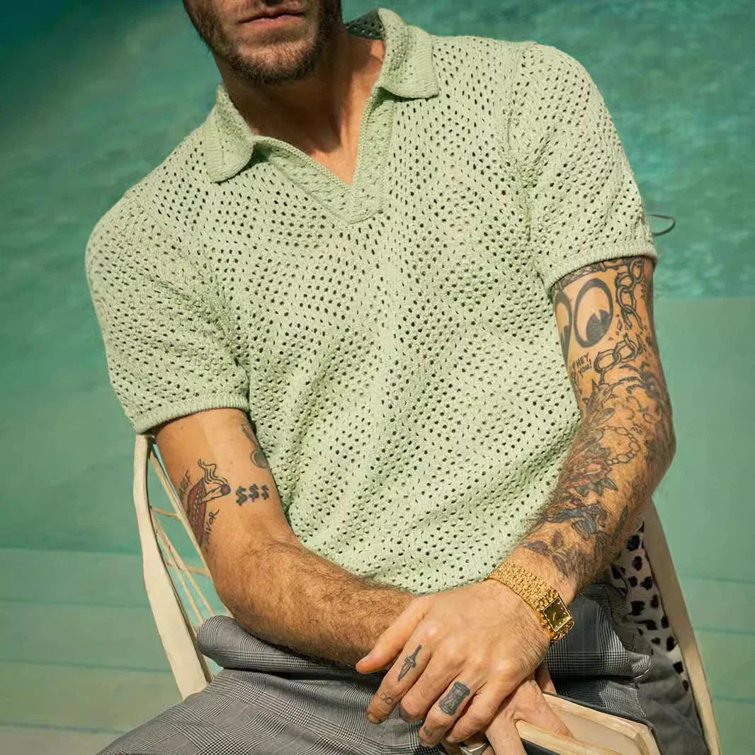 A stylish and comfortable men's knitted shirt in a classic British design, made from premium polyester fabric for breathability and softness.