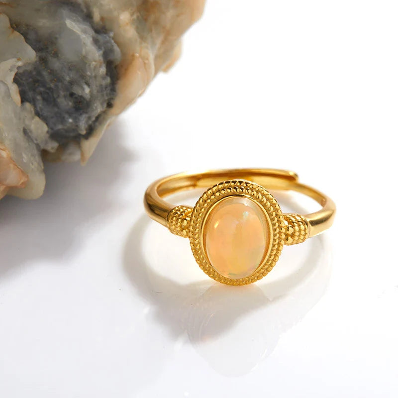 Elegant S925 sterling silver ring with a natural opal gemstone in a geometric design