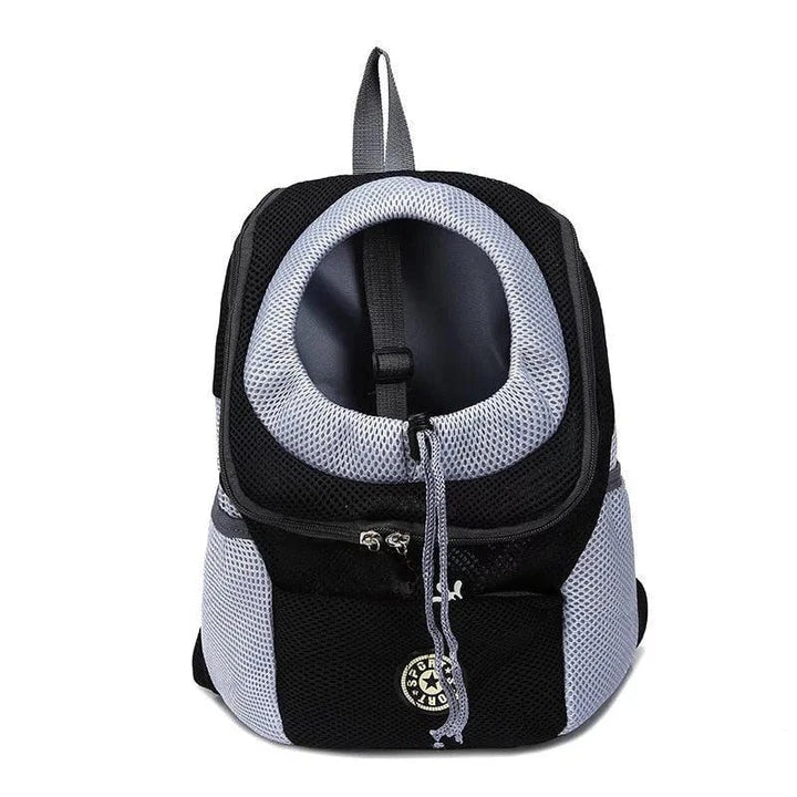 Compact dog carrier backpack made of durable nylon with a convenient front hole for small dogs to poke their head out