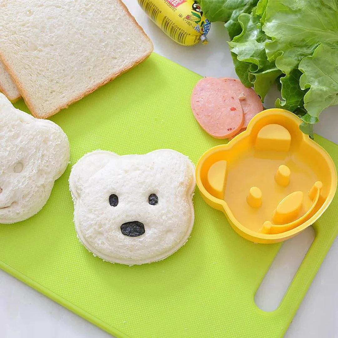A yellow bear-shaped sandwich cutter used to create fun, creative sandwiches for children
