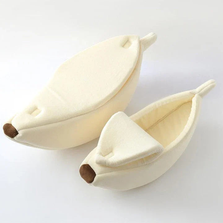 A cosy, banana-shaped cat bed made of plush, supportive materials in various vibrant colours to provide a comfortable and stylish retreat for feline friends.