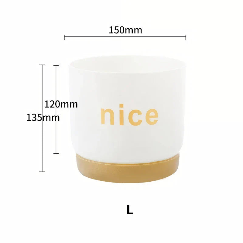 Elegant self-watering planters in various sizes, perfect for indoor plants and home or office decor