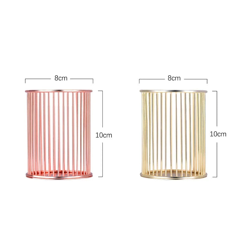Rose gold plated pen holder with a sleek, minimalist design for organising pens, makeup brushes, and other desk accessories