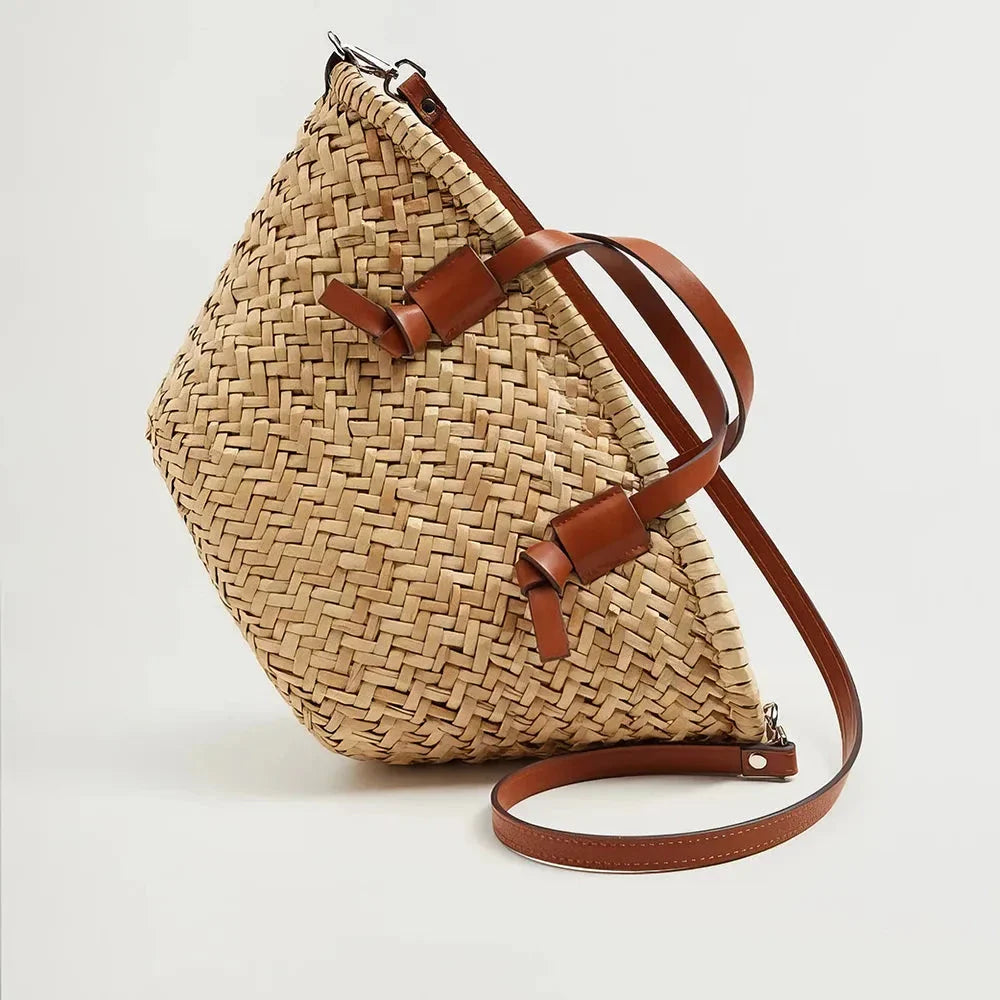 Elegant woven wicker basket bag in brown, perfect for summer adventures and carrying essentials