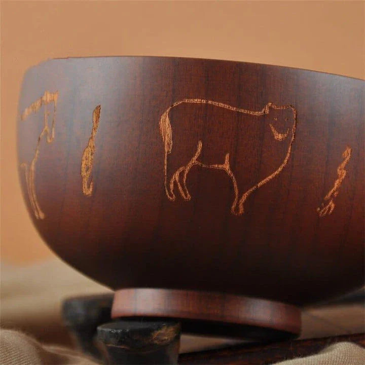 Elegant Mongolian-style wooden serving bowl with a smooth, natural grain and subtly curved silhouette