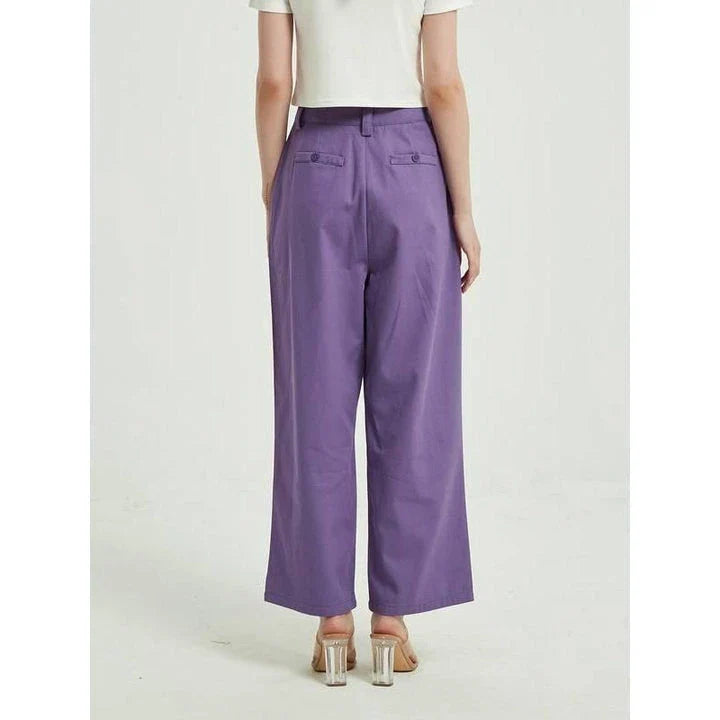 Elegant purple high-waisted wide-leg trousers with a vintage-inspired design, perfect for the modern British woman