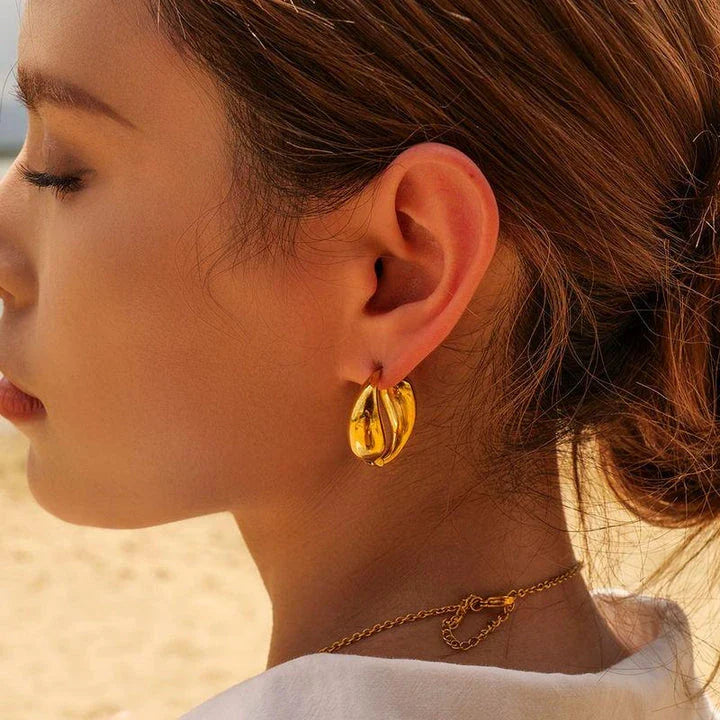 Elegant 18K gold-plated stainless steel water drop earrings with a vintage-inspired O-shaped pendant