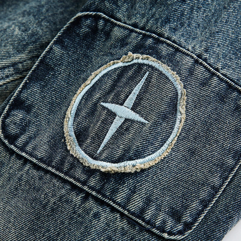 Retro-inspired men's denim jacket with intricate embroidered detailing, perfect for casual and smart-casual outfits