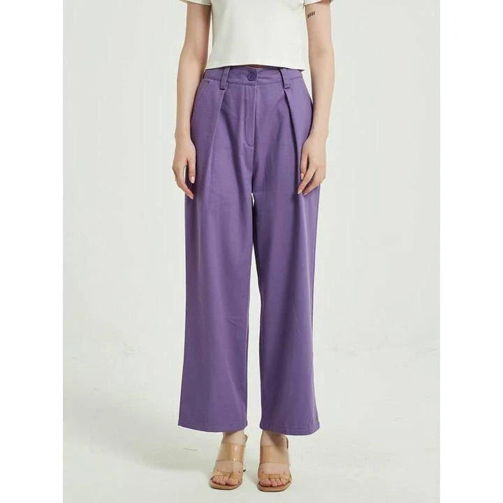 Elegant purple high-waisted wide-leg trousers with a vintage-inspired design, perfect for the modern British woman