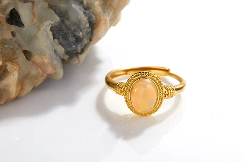 Elegant S925 sterling silver ring with a natural opal gemstone in a geometric design