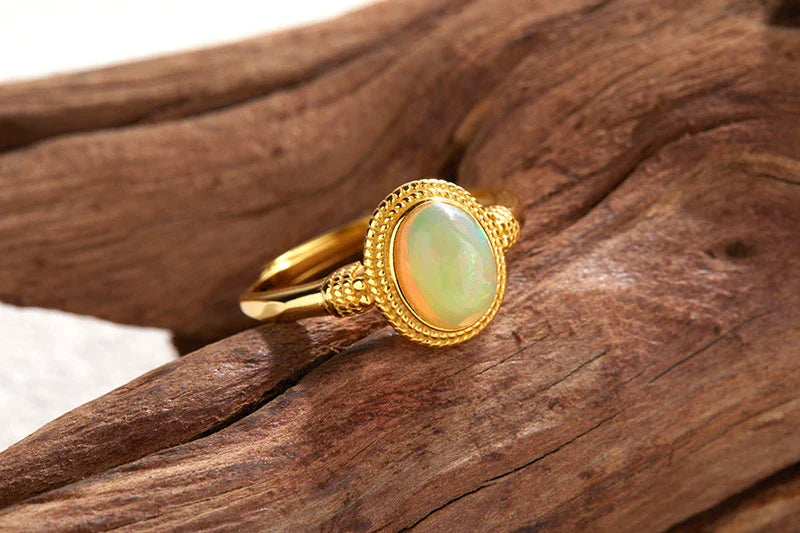 Elegant S925 sterling silver ring with a natural opal gemstone in a geometric design