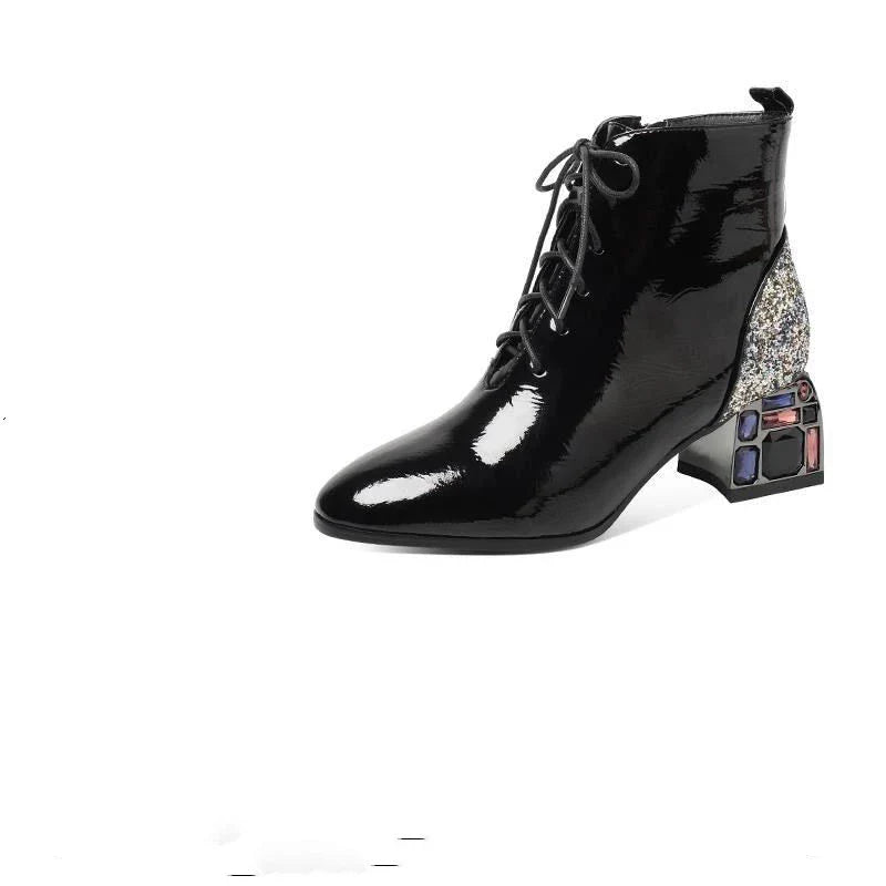 Elegant rhinestone embellished patent leather high heels in a wine red colour