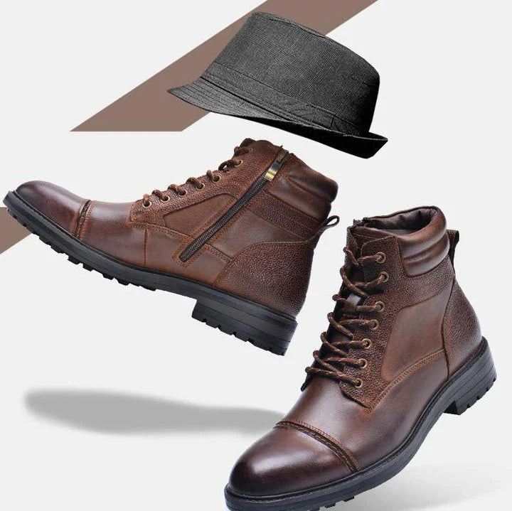 A pair of durable, stylish cowhide leather men's boots in a classic British design