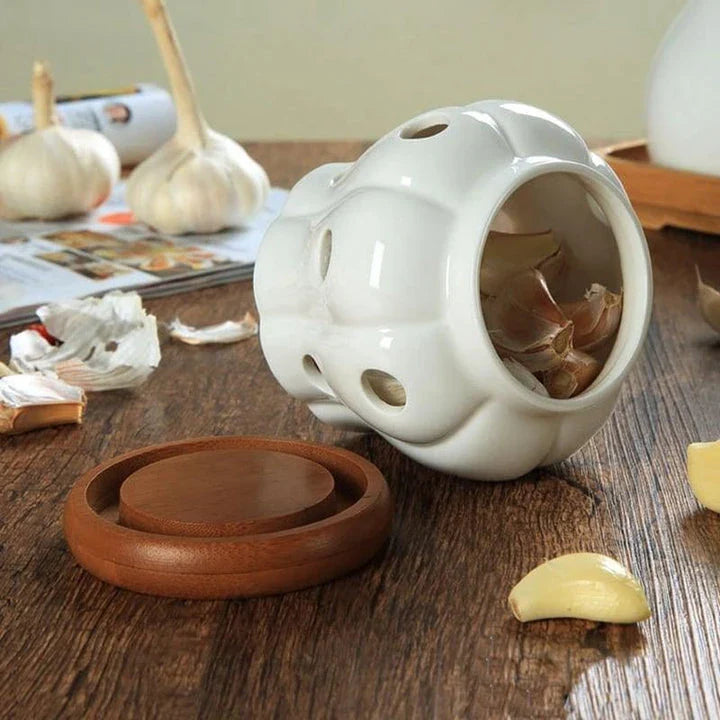 Ceramic and wood garlic storage jar with airtight design and stylish appearance for modern British kitchens