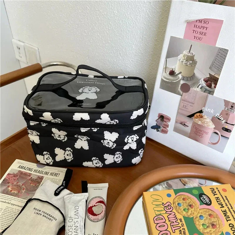 Cute dog-themed makeup bag with a playful design, made from durable cotton and PVC materials for practical and stylish organisation.