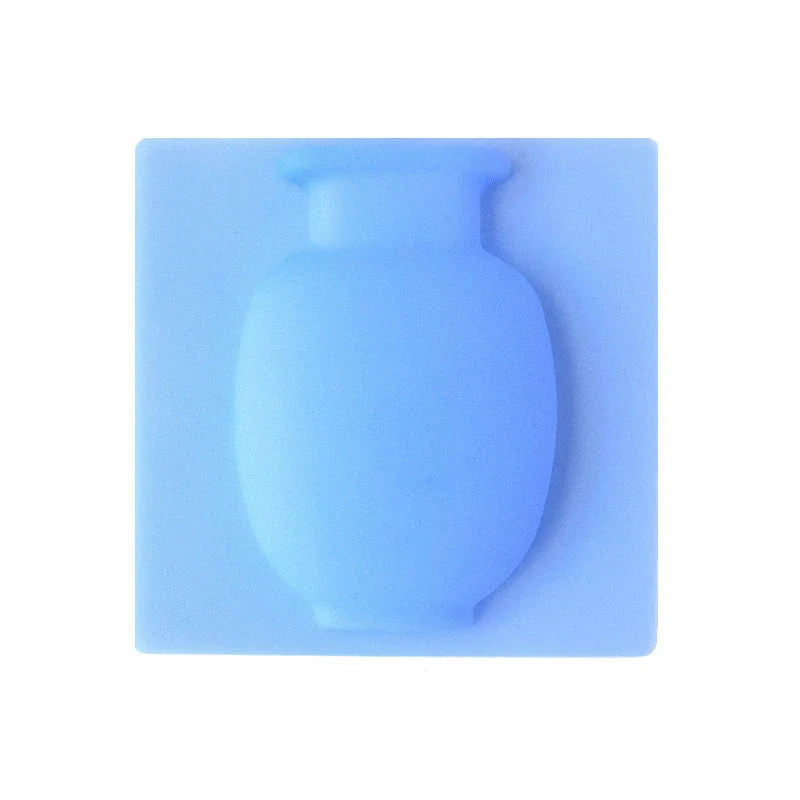 Elegant silicone suction wall vase in pink, designed to hold various plant sizes and fit seamlessly in modern homes
