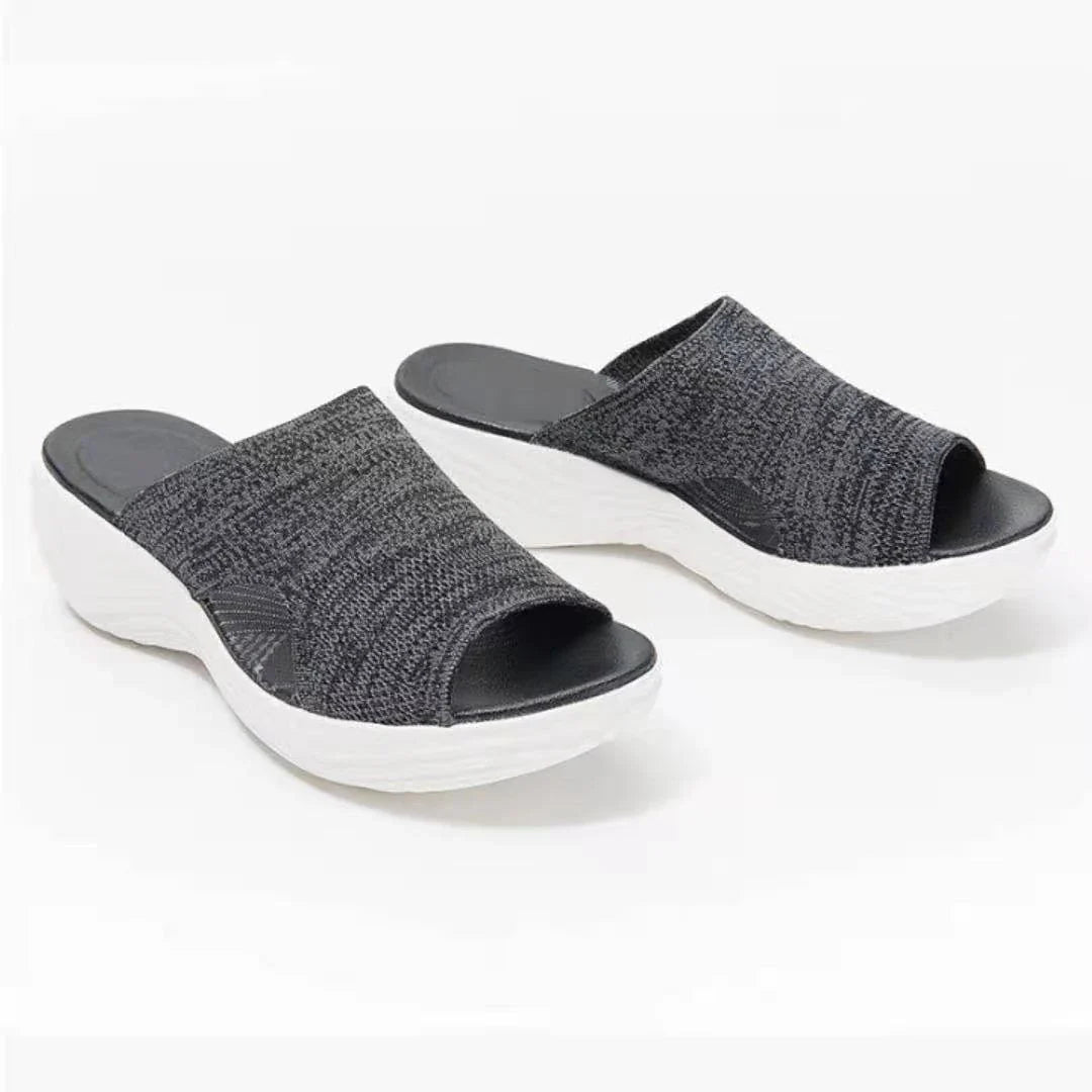 Plus size women's sporty sandals in blue, black, and pink colours featuring a chic fishmouth toe design and a comfortable, supportive sole