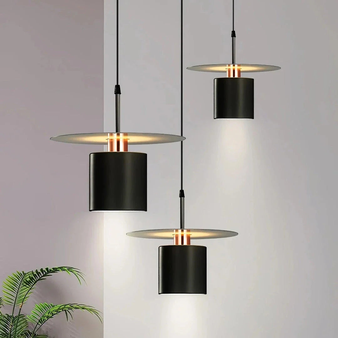 A modern and elegant minimalist pendant light made of durable metal with a smooth painted finish, providing focused and cosy illumination for a variety of interior spaces.