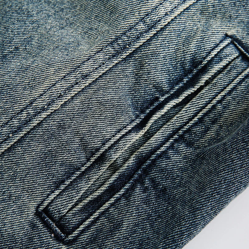 Retro-inspired men's denim jacket with intricate embroidered detailing, perfect for casual and smart-casual outfits