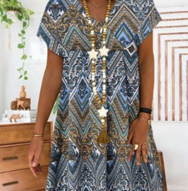 A stunning blue women's fashion dress with a flattering silhouette and elegant design