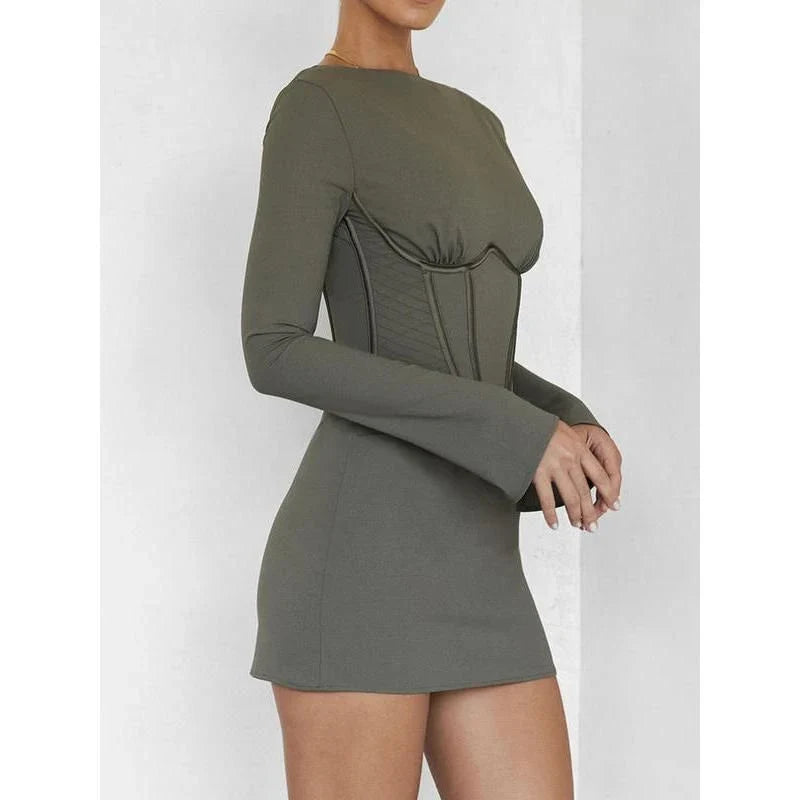 A stylish backless mini dress in a luxurious cotton-polyester blend, perfect for elegant autumn nights out