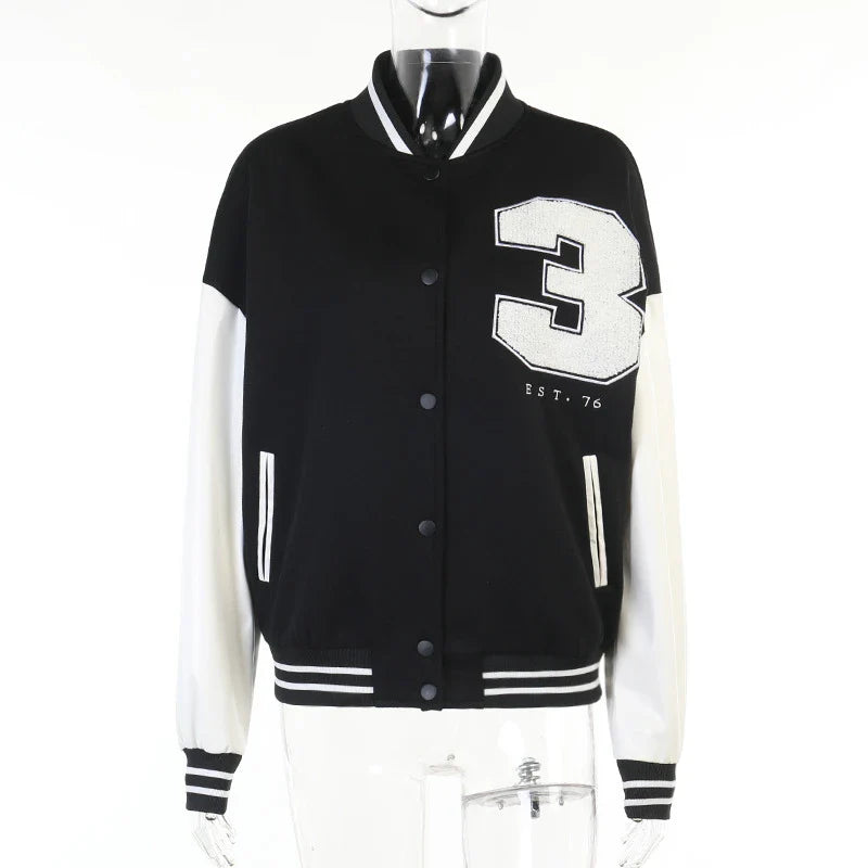 A classic British-style baseball jacket with contrast PU stitching, showcasing a sophisticated and versatile design for casual wear.
