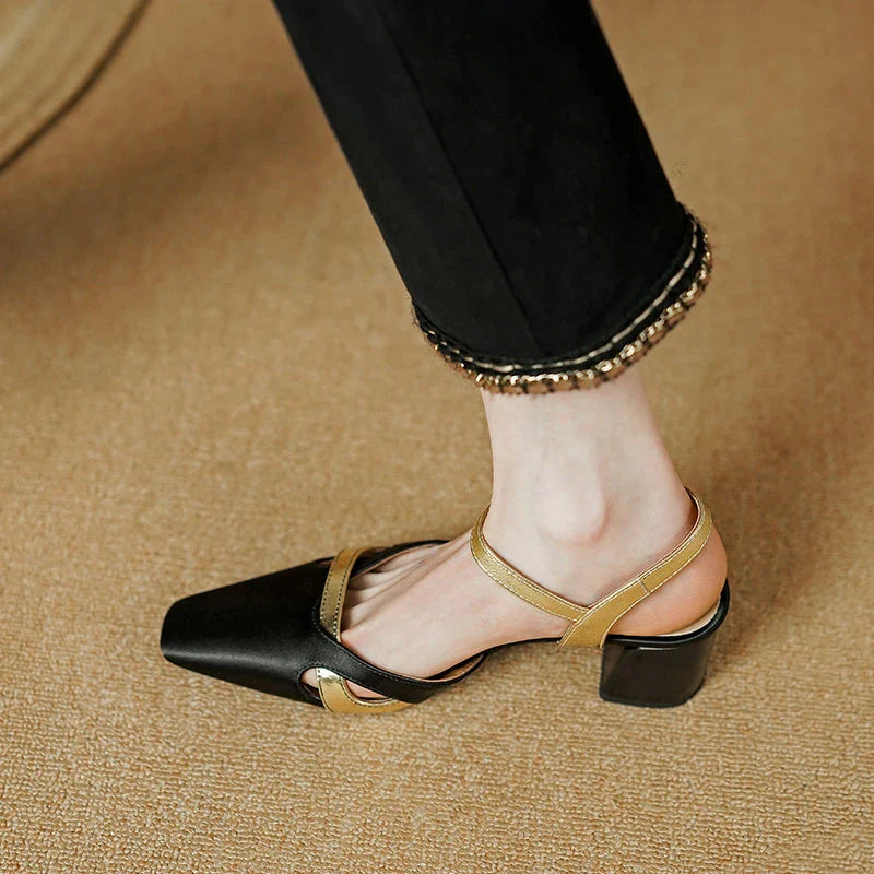 Elegant green high heel sandals with ankle strap, showcasing a sophisticated square heel design and premium materials