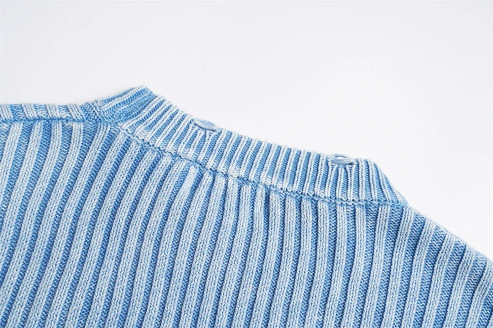 Classic ripped round neck jumper in a monochrome colour scheme, featuring a unique sunken stripe detail and a relaxed, comfortable fit.