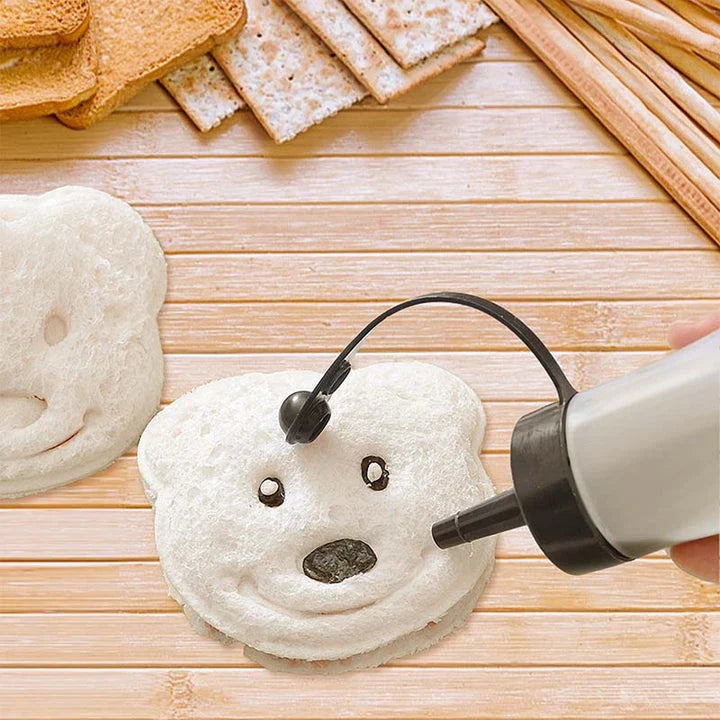 A yellow bear-shaped sandwich cutter used to create fun, creative sandwiches for children