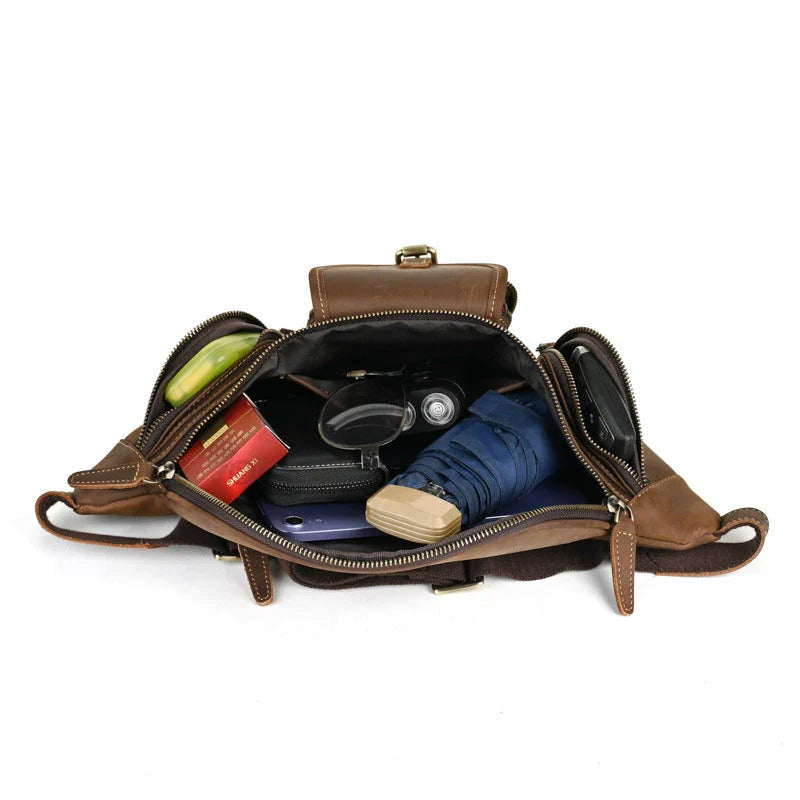 A classic leather satchel bag with a retro-inspired design, suitable for everyday use and commuting on a motorcycle.