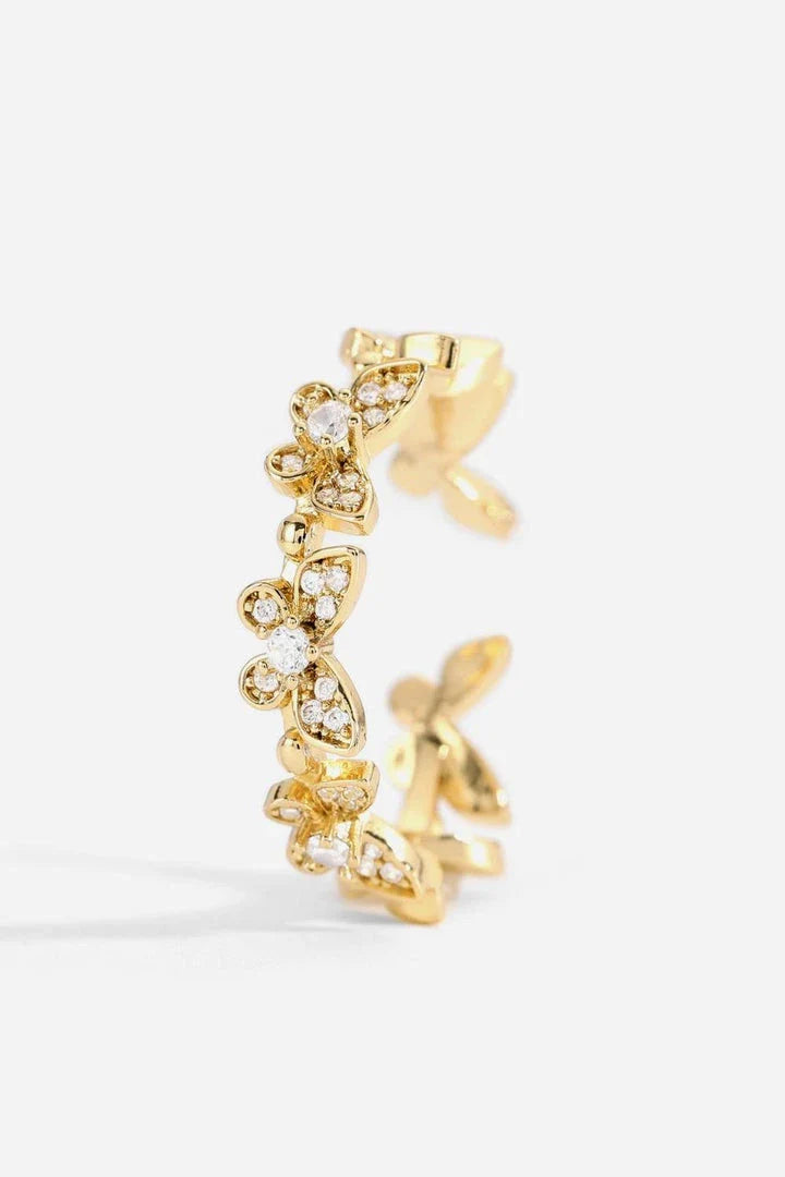 Elegant gold-toned open ring with a captivating butterfly design accented by sparkling zircon stones