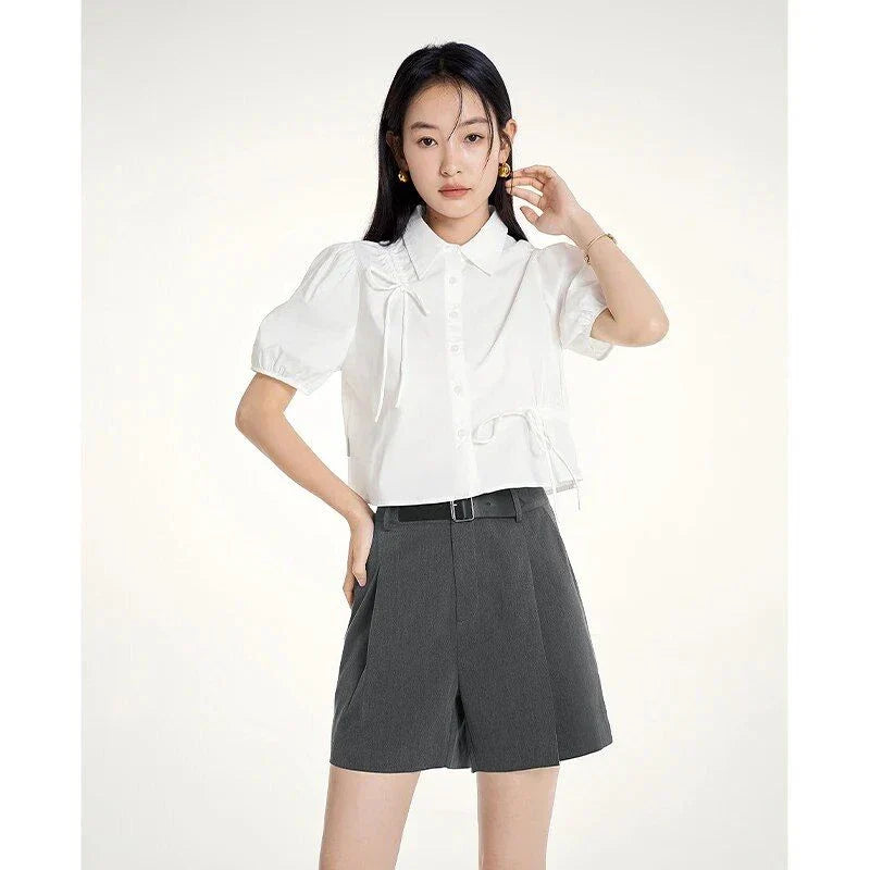 Elegant, high-waist harem shorts for women in the UK, featuring a relaxed, flowing silhouette and practical details for comfortable, stylish summer wear.