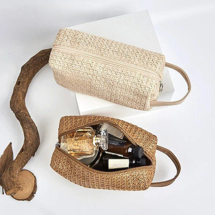 Elegant straw cosmetic bag with unique knitting pattern, ideal for organizing makeup and toiletries