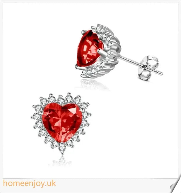 Elegant sterling silver earrings featuring a heart-shaped design and sparkling cubic zirconia stones