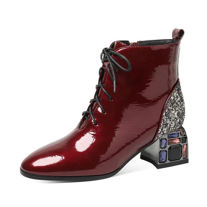 Elegant rhinestone embellished patent leather high heels in a wine red colour