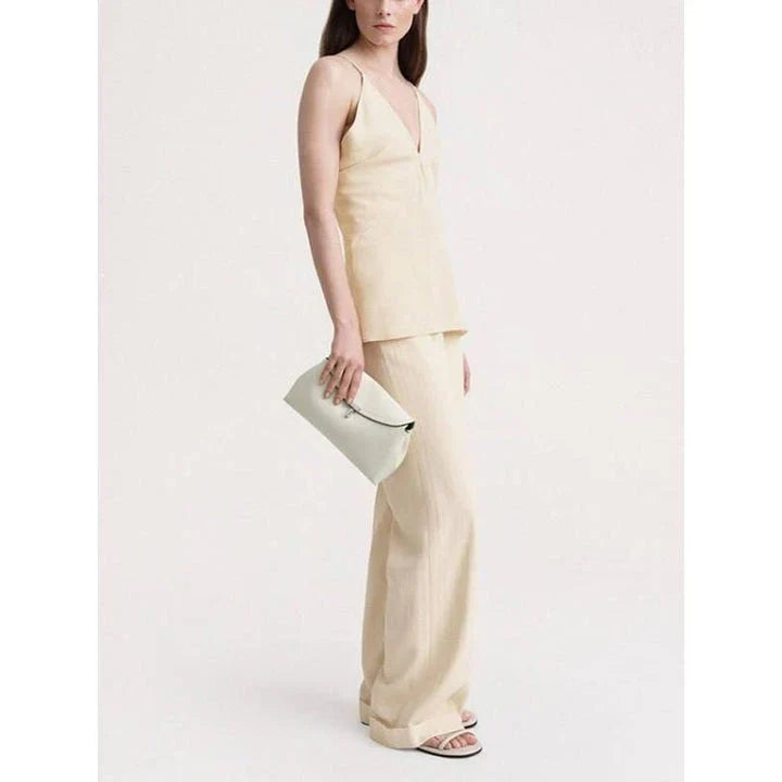 Elegant summer camisole with v-neck and backless design, made from soft viscose fabric for comfort and style