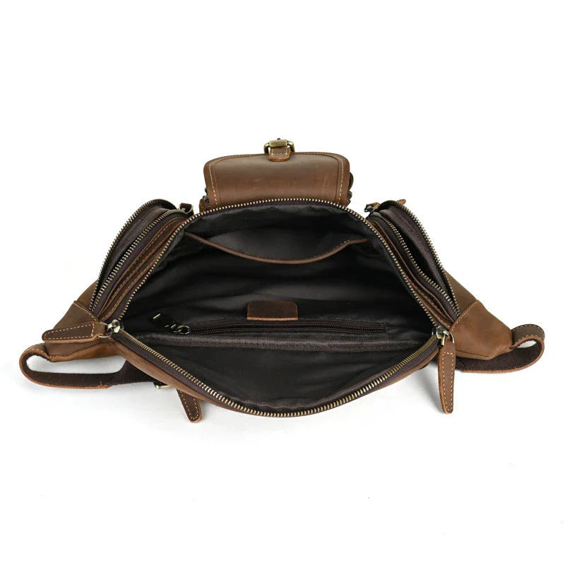 A classic leather satchel bag with a retro-inspired design, suitable for everyday use and commuting on a motorcycle.