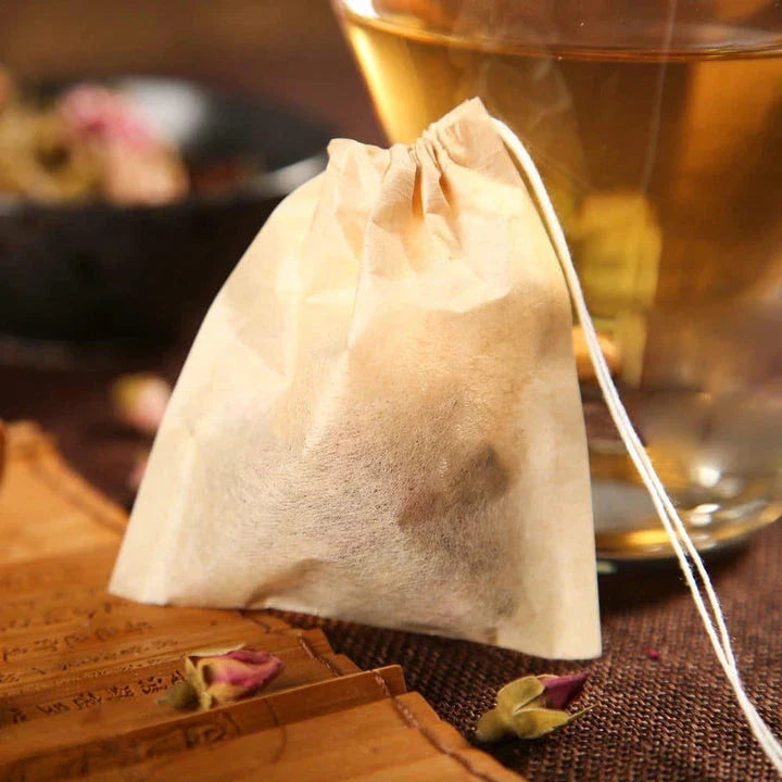 Disposable paper tea bags in various sizes, made with premium non-woven fabric for superior infusion and convenient, on-the-go enjoyment.