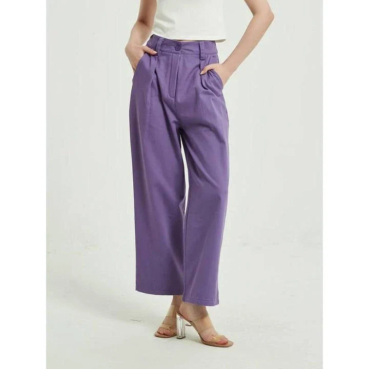 Elegant purple high-waisted wide-leg trousers with a vintage-inspired design, perfect for the modern British woman