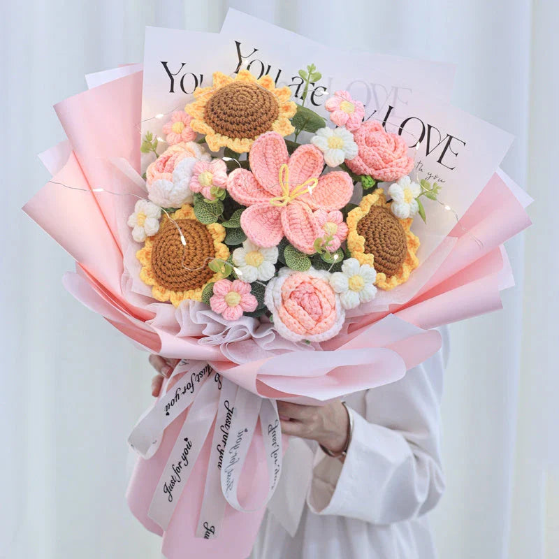 Beautifully crafted knitted bouquet with vibrant sunflowers, featuring a warm LED lighting system for a captivating display