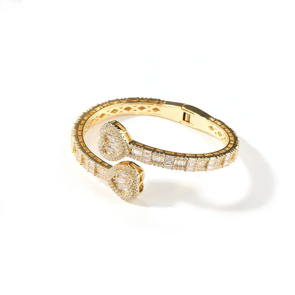 Elegant geometric bracelet with diamond accents in gold, silver, and rose gold finishes