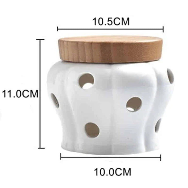 Ceramic and wood garlic storage jar with airtight design and stylish appearance for modern British kitchens