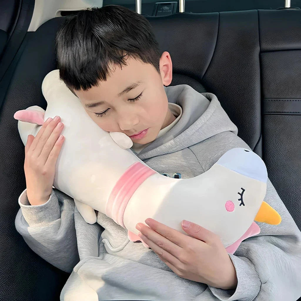 Comfortable car seat belt cushion pads with soft, breathable polyester fabric and plush PP cotton filling in fun cartoon designs including a giant goose, pink dinosaur, long-necked green dragon, and yellow giraffe