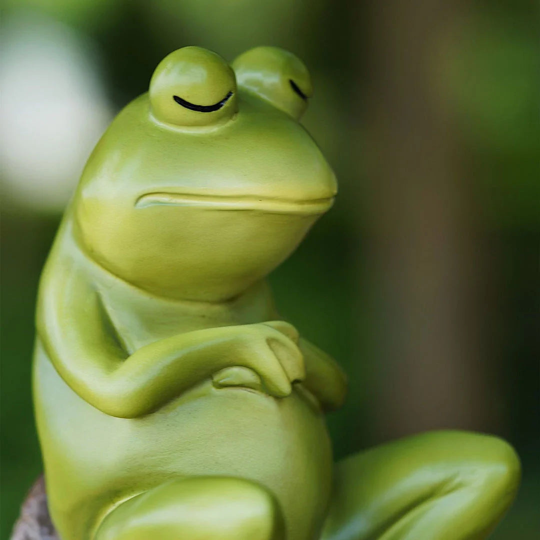 Charming resin figurine of a thoughtful, contemplative frog in a realistic pose, perfect for home or garden decor